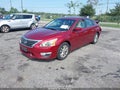 2015 Nissan Altima — photo 2 of 16 | VIN 1N4AL3AP4FC113245