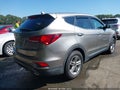 2017 Hyundai Santa Fe — photo 4 of 16 | VIN 5XYZTDLB4HG430977