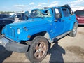 2011 Jeep Wrangler Unlimited — photo 2 of 11 | VIN 1J4BA5H10BL562931