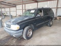 2000 Ford Explorer — photo 2 of 11 | VIN 1FMZU63P8YZB80435