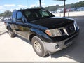 2009 Nissan Frontier — photo 1 of 13 | VIN 1N6BD06T99C416278