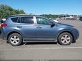 2014 Toyota RAV4 — photo 13 of 17 | VIN JTMRFREV9ED066092