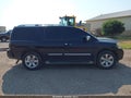 2012 Nissan Armada — photo 13 of 16 | VIN 5N1BA0NC8CN602933