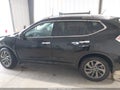 2016 Nissan Rogue — photo 15 of 17 | VIN 5N1AT2MV0GC884250
