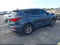 2017 Hyundai Santa Fe — photo 4 of 16 | VIN 5XYZT3LB9HG435957