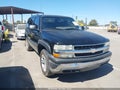 2004 Chevrolet Tahoe — photo 1 of 16 | VIN 1GNEK13T04R119462