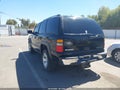 2004 Chevrolet Tahoe — photo 3 of 16 | VIN 1GNEK13T04R119462