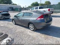 2010 Honda Insight — photo 3 of 11 | VIN JHMZE2H70AS001014