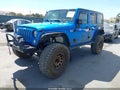 2016 Jeep Wrangler Unlimited — photo 2 of 17 | VIN 1C4BJWDG8GL137051