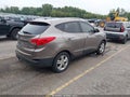 2010 Hyundai Tucson — photo 4 of 16 | VIN KM8JU3ACXAU111079