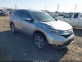 2018 Honda CR-V — photo 1 of 18 | VIN 2HKRW2H59JH644943
