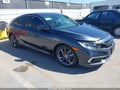2021 Honda Civic — photo 1 of 16 | VIN 19XFC1F30ME208580