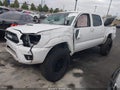 2013 Toyota Tacoma — photo 2 of 13 | VIN 3TMJU4GNXDM149732