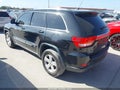 2012 Jeep Grand Cherokee — photo 3 of 11 | VIN 1C4RJFAG9CC349860