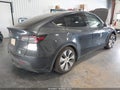 2024 Tesla Model Y — photo 4 of 15 | VIN 7SAYGDEE3RA287651