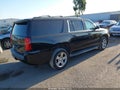 2015 Chevrolet Suburban 1500 — photo 4 of 18 | VIN 1GNSCJKC1FR710727