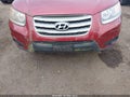 2012 Hyundai Santa Fe — photo 6 of 11 | VIN 5XYZGDAB8CG119908