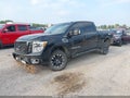 2018 Nissan Titan — photo 2 of 19 | VIN 1N6BA1F4XJN528832