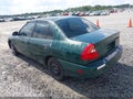 2000 Mitsubishi Mirage — photo 3 of 11 | VIN JA3AY26C9YU006442