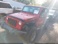 2015 Jeep Wrangler — photo 2 of 16 | VIN 1C4AJWAG1FL580754