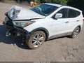 2013 Hyundai Santa Fe — photo 2 of 10 | VIN 5XYZUDLA5DG071816