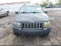2004 Jeep Grand Cherokee — photo 13 of 17 | VIN 1J4GX48S54C215315