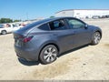 2023 Tesla Model Y — photo 4 of 18 | VIN 7SAYGDEEXPF796555