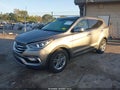 2017 Hyundai Santa Fe — photo 2 of 17 | VIN 5NMZUDLB6HH051322