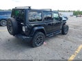 2021 Jeep Wrangler Unlimited — photo 4 of 17 | VIN 1C4HJXEN2MW653686