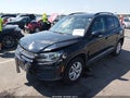 2016 Volkswagen Tiguan — photo 2 of 16 | VIN WVGAV7AX1GW597365