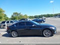 2018 Infiniti Q50 — photo 13 of 16 | VIN JN1CV7AR2JM280151