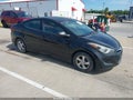 2014 Hyundai Elantra — photo 1 of 12 | VIN 5NPDH4AE4EH533460