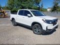 2023 Honda Ridgeline — photo 1 of 16 | VIN 5FPYK3F50PB066309