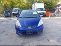2011 Honda Fit — photo 13 of 15 | VIN JHMGE8H53BC021990