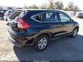 2015 Honda CR-V — photo 4 of 16 | VIN 5J6RM4H38FL057842