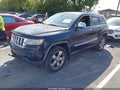 2011 Jeep Grand Cherokee — photo 2 of 16 | VIN 1J4RR6GG1BC586934
