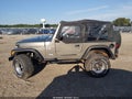 2004 Jeep Wrangler — photo 14 of 16 | VIN 1J4FA39S14P775122