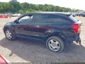 2009 Dodge Caliber — photo 13 of 15 | VIN 1B3HB48A49D183864