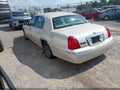 1999 Lincoln Town Car — photo 3 of 16 | VIN 1LNHM83W7XY669086