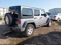 2015 Jeep Wrangler Unlimited — photo 4 of 16 | VIN 1C4BJWDG8FL657670