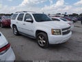 2011 Chevrolet Tahoe — photo 1 of 15 | VIN 1GNSCCE03BR141466