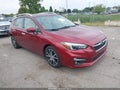 2017 Subaru Impreza — photo 1 of 16 | VIN 4S3GTAU63H3734104