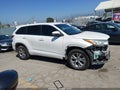 2016 Toyota Highlander — photo 14 of 17 | VIN 5TDZKRFH0GS122139