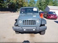 2015 Jeep Wrangler Unlimited — photo 12 of 16 | VIN 1C4BJWDG1FL734590