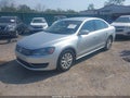 2013 Volkswagen Passat — photo 2 of 16 | VIN 1VWAP7A33DC086200