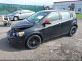 2015 Chevrolet Sonic — photo 2 of 16 | VIN 1G1JC6SG9F4171249