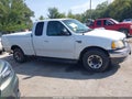 2002 Ford F-150 — photo 13 of 18 | VIN 1FTPX17L12NB49636