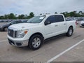 2018 Nissan Titan — photo 2 of 17 | VIN 1N6AA1E61JN512355