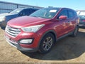 2013 Hyundai Santa Fe — photo 2 of 11 | VIN 5XYZU3LB9DG096611
