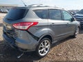2014 Ford Escape — photo 4 of 11 | VIN 1FMCU0J95EUC89743